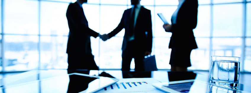 business people shaking hands at meeting