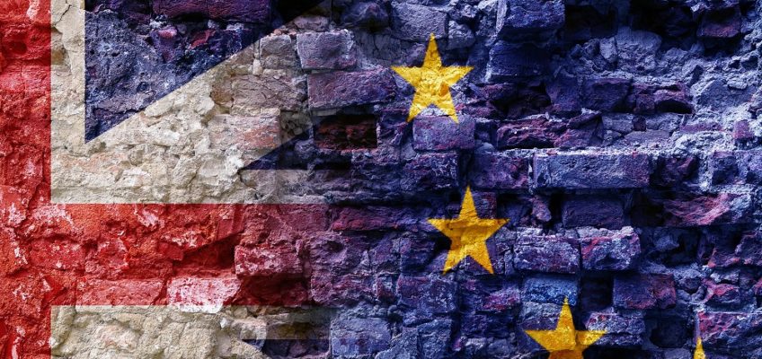 Brexit, flags of the European Union and the United Kingdom as overlay on an old brick wall