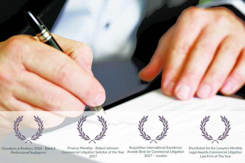 Close up of businessman signing a contract.