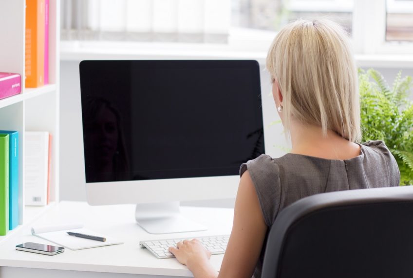 Young professional woman working in the office