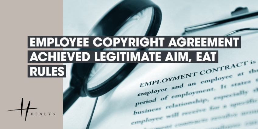 image of a magnifying glass over an employment contract