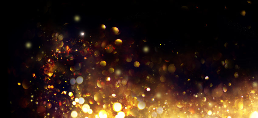 Image of golden glitter on black background