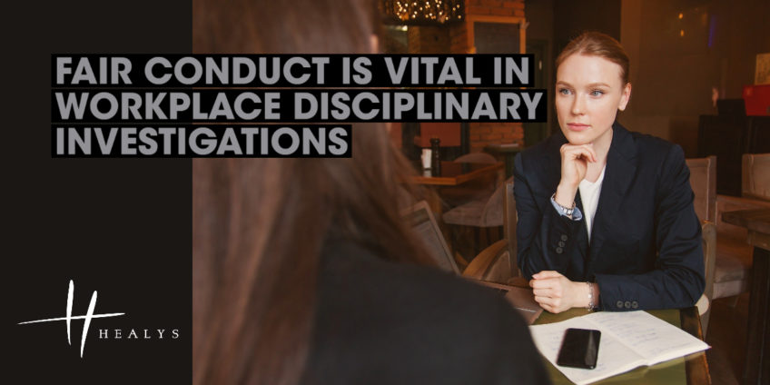 Over the shoulder shot of women speaking at a business meeting