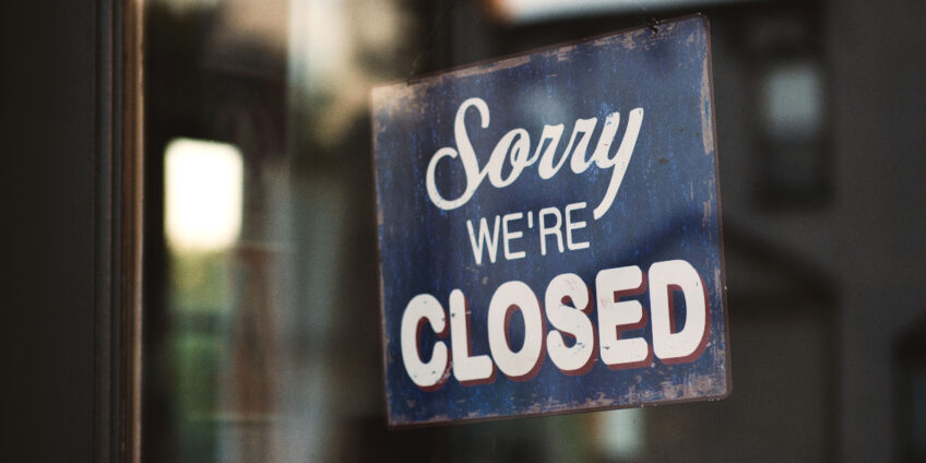 closed sign in shop window