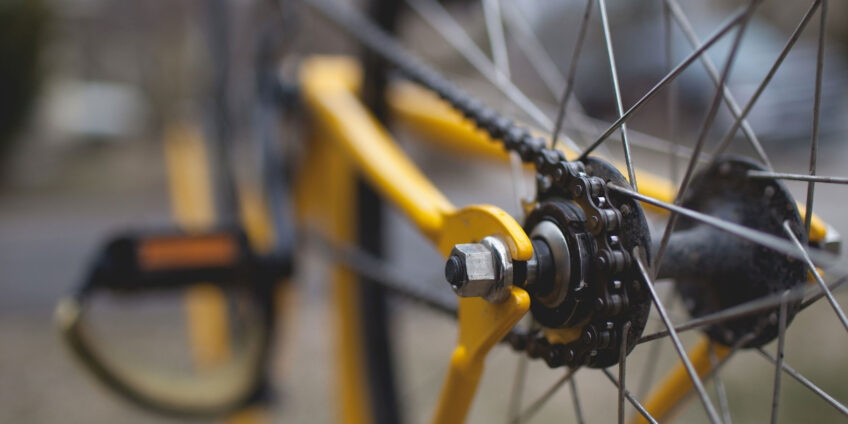 close up of bicycle wheel from fallen bike